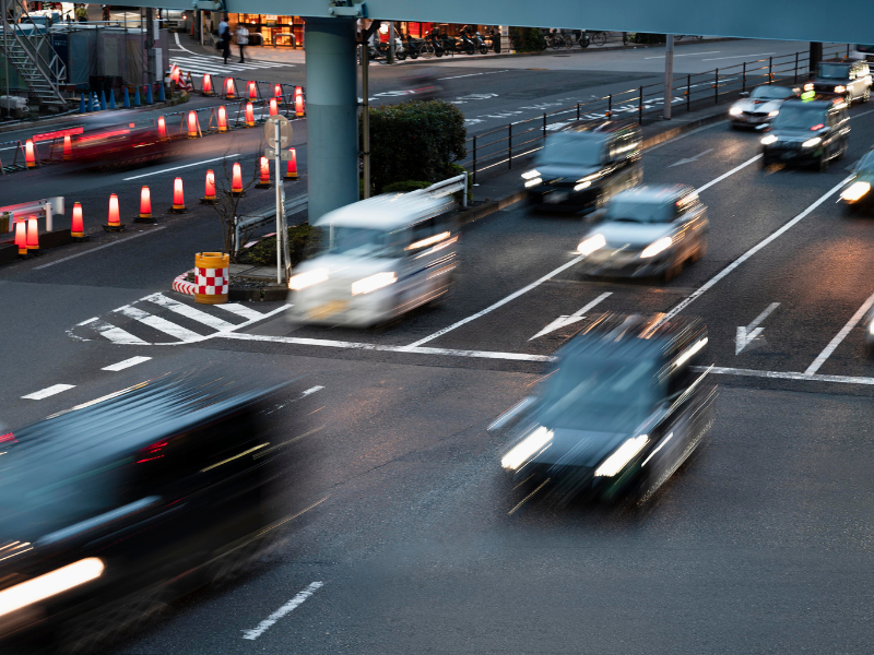 people-driving-cars-city-street